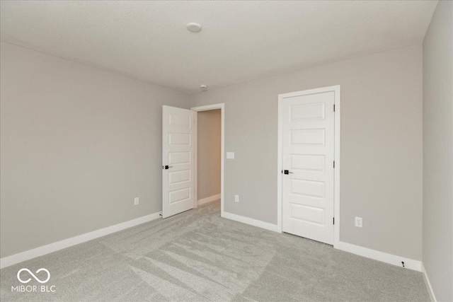 6973 Oakdale Ln, Avon, IN 46123 - unfurnished bedroom featuring carpet and baseboards