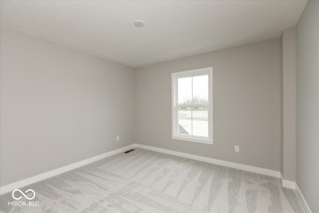 6973 Oakdale Ln, Avon, IN 46123 - empty room with visible vents, baseboards, and light carpet