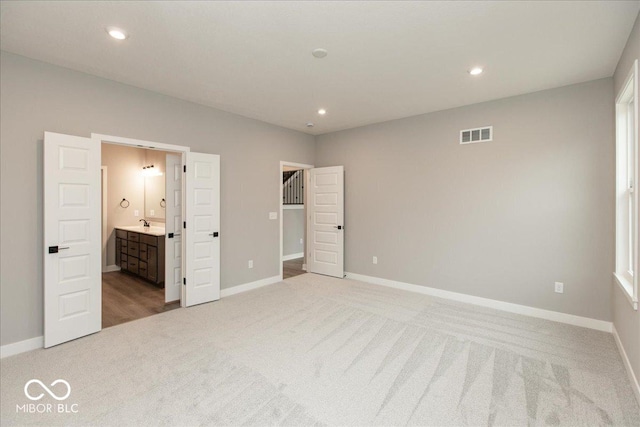 6973 Oakdale Ln, Avon, IN 46123 - unfurnished bedroom featuring recessed lighting, visible vents, light colored carpet, and baseboards