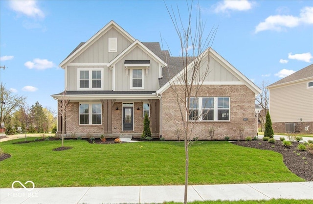 6973 Oakdale Ln, Avon, IN 46123 - craftsman house featuring board and batten siding, brick siding, and central AC