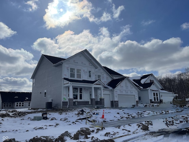 property under construction featuring a garage and central AC