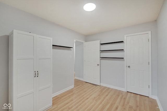 unfurnished bedroom featuring light hardwood / wood-style flooring