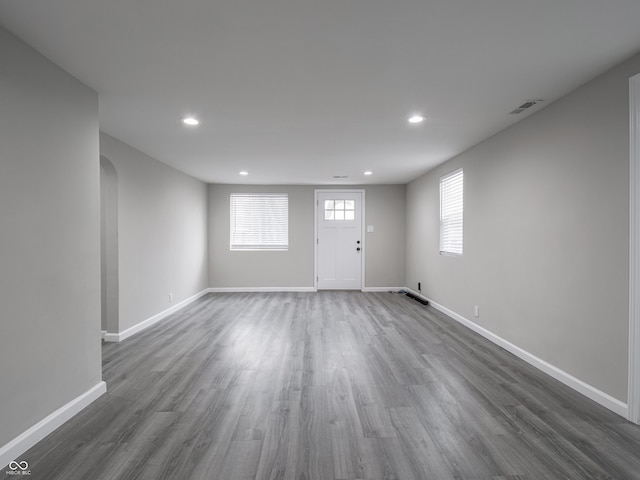 interior space with dark hardwood / wood-style flooring