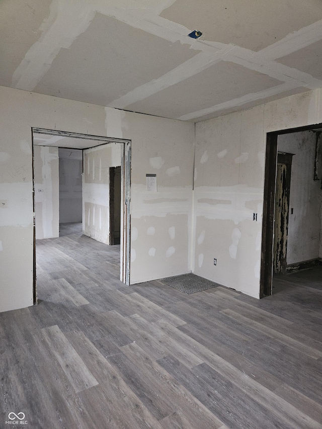 empty room featuring hardwood / wood-style floors