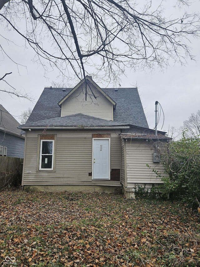 1207 W 35th St, Indianapolis, IN 46208 - rear view of house featuring roof with shingles