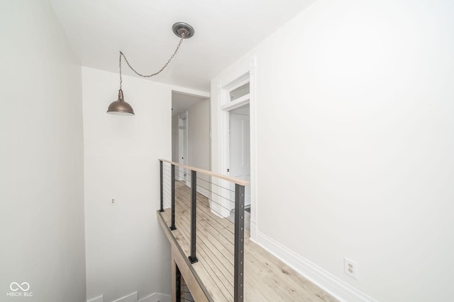 corridor featuring light hardwood / wood-style floors