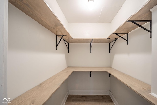 walk in closet featuring light wood-type flooring