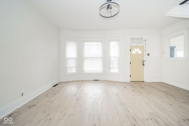 interior space with light hardwood / wood-style flooring