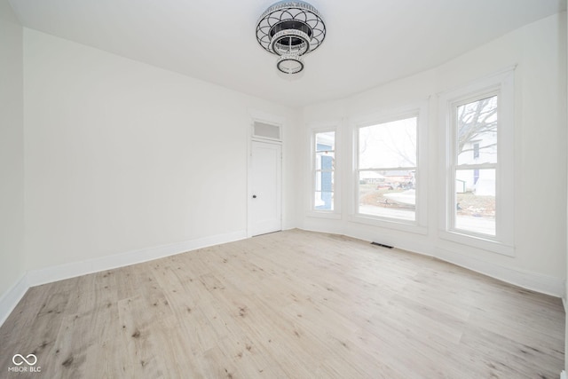 empty room featuring light wood-type flooring