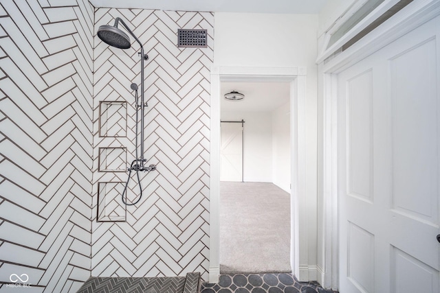 interior space with a tile shower