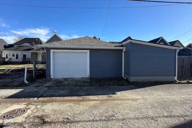 view of property exterior with a garage