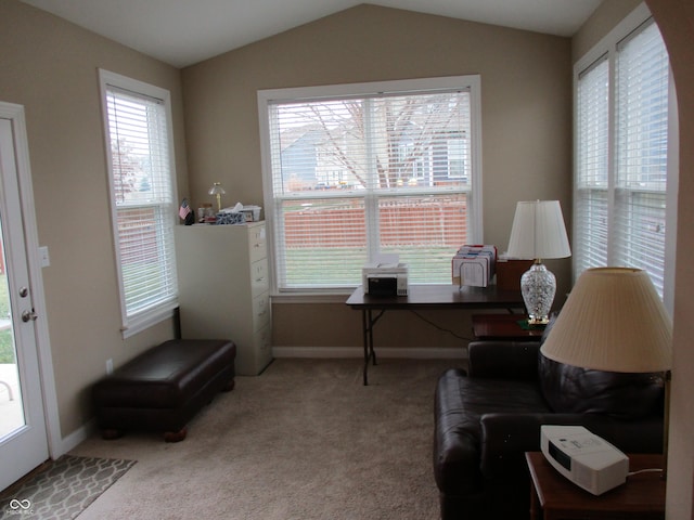 sitting room with carpet and lofted ceiling