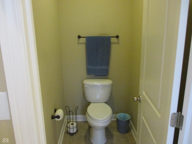 bathroom featuring tile patterned floors and toilet