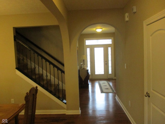 entrance foyer with dark wood-type flooring