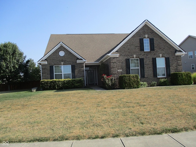 view of front of property with a front lawn