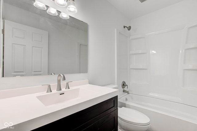 full bathroom featuring shower / tub combination, vanity, and toilet