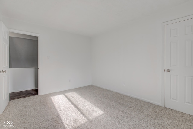 empty room featuring carpet flooring