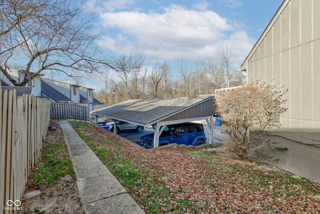 view of yard with a carport