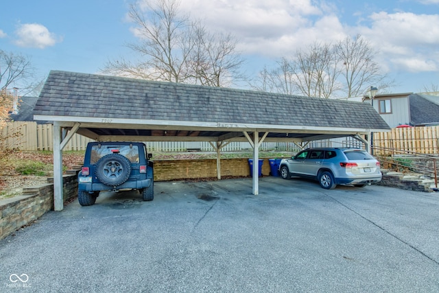 view of car parking featuring a carport