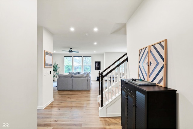 interior space featuring hardwood / wood-style flooring and ceiling fan