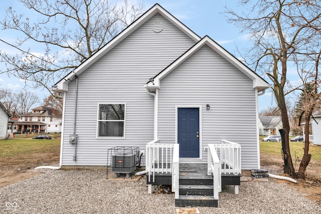 rear view of house with central air condition unit