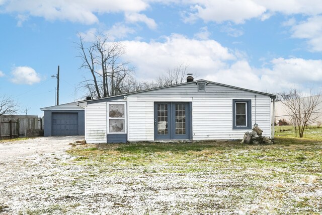 4925 W Raymond St, Indianapolis, IN 46241 - view of front of home with a chimney and dirt driveway