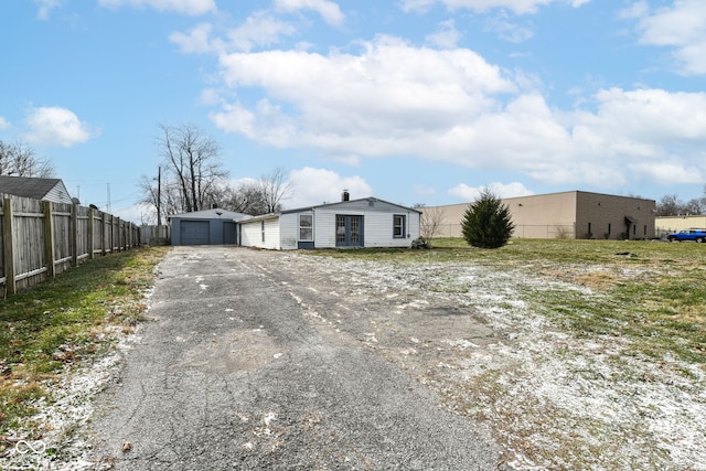 exterior space with a garage