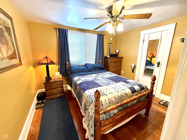 bedroom featuring ceiling fan and hardwood / wood-style floors