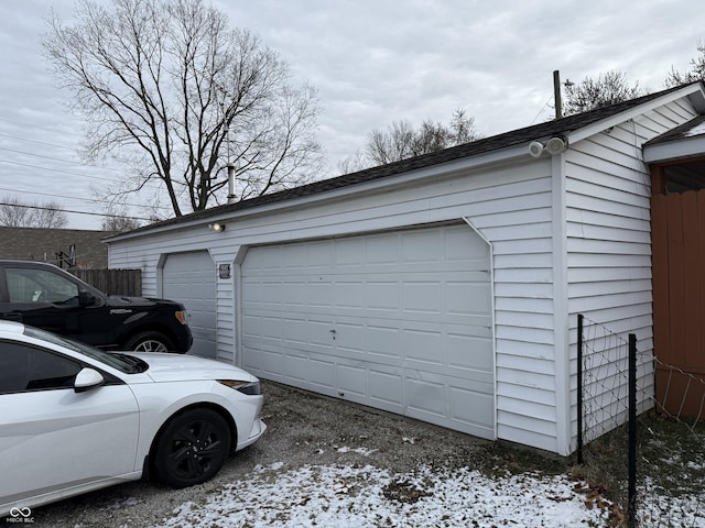 view of snow covered garage