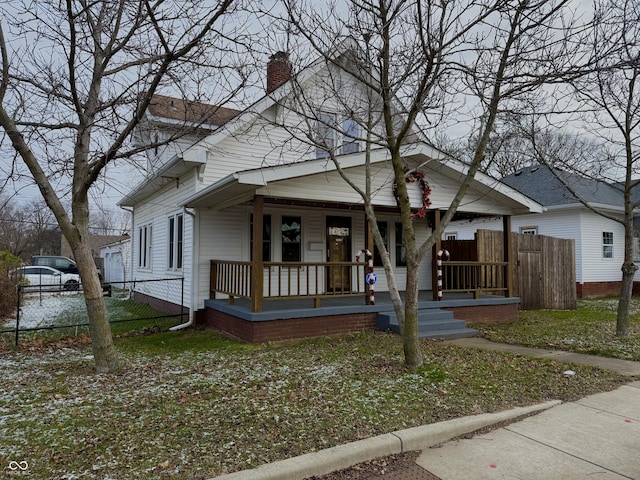 bungalow-style house featuring covered porch