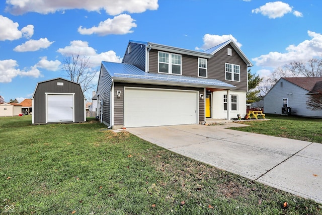 view of property featuring a front lawn, a shed, and a garage