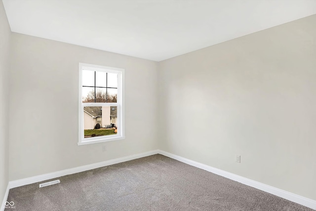 view of carpeted spare room