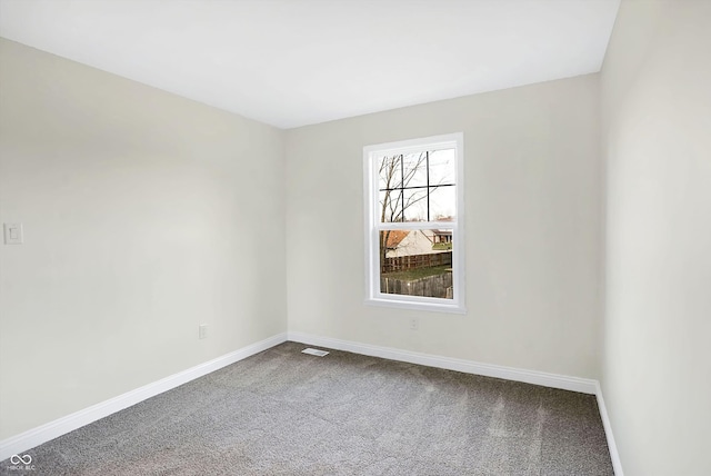 unfurnished room with carpet floors