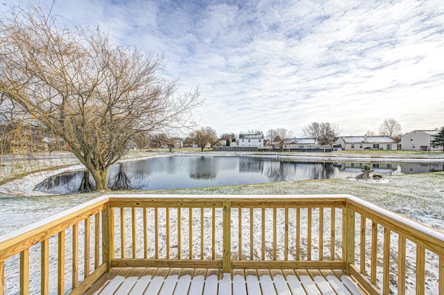 wooden terrace with a water view