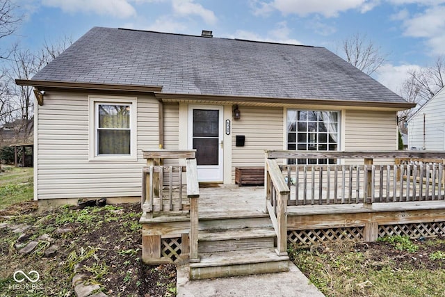 bungalow-style house featuring a wooden deck