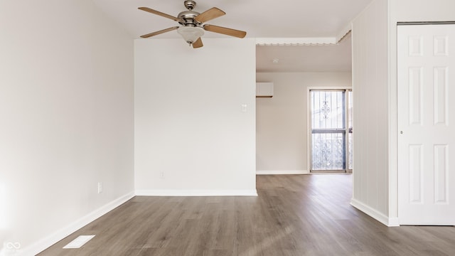 unfurnished room featuring ceiling fan and light wood-type flooring