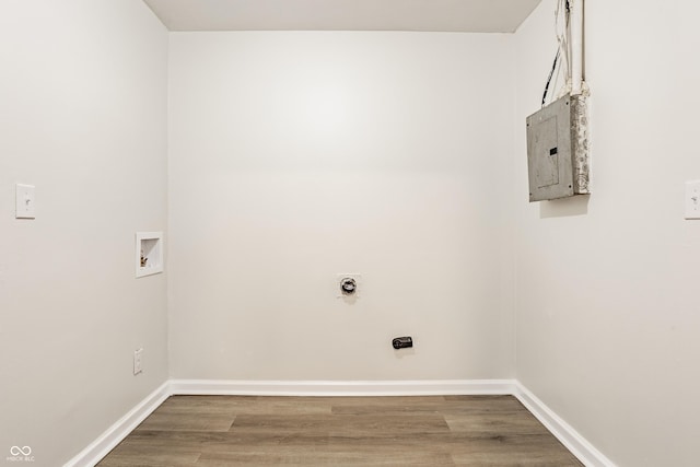 washroom featuring wood-type flooring, hookup for a washing machine, and electric dryer hookup