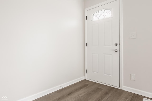 foyer featuring dark wood-type flooring