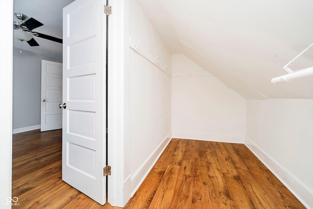 additional living space with wood-type flooring, ceiling fan, and lofted ceiling