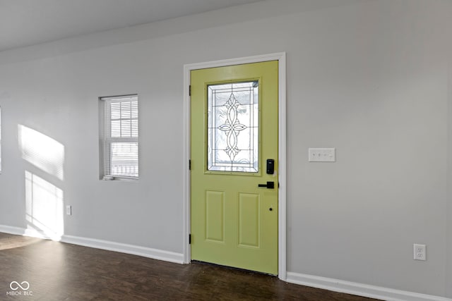 foyer with dark hardwood / wood-style floors