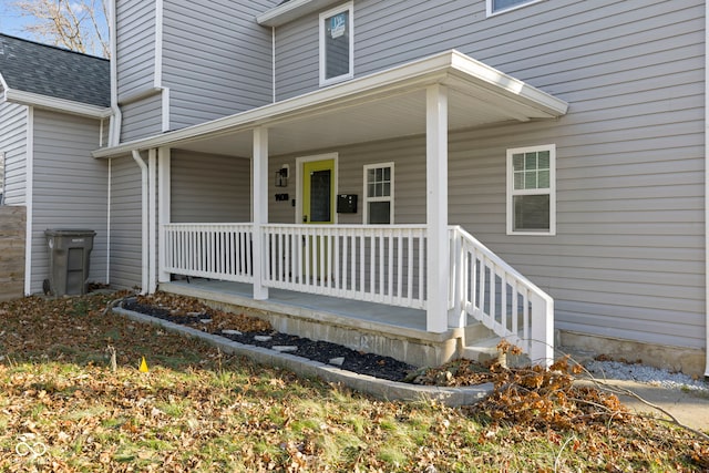 entrance to property featuring covered porch