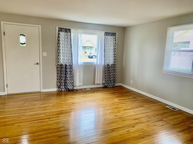 entrance foyer with light hardwood / wood-style flooring