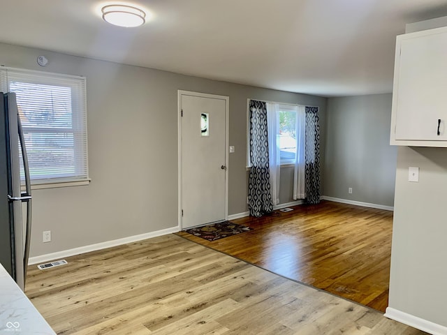 entrance foyer with light hardwood / wood-style floors