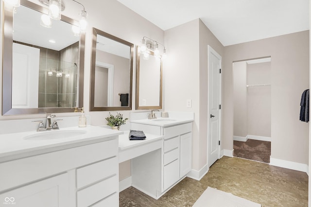 bathroom featuring vanity and a shower with shower door