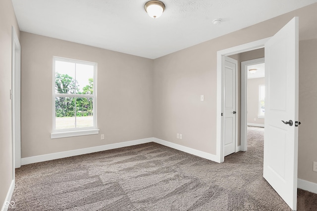 view of carpeted spare room