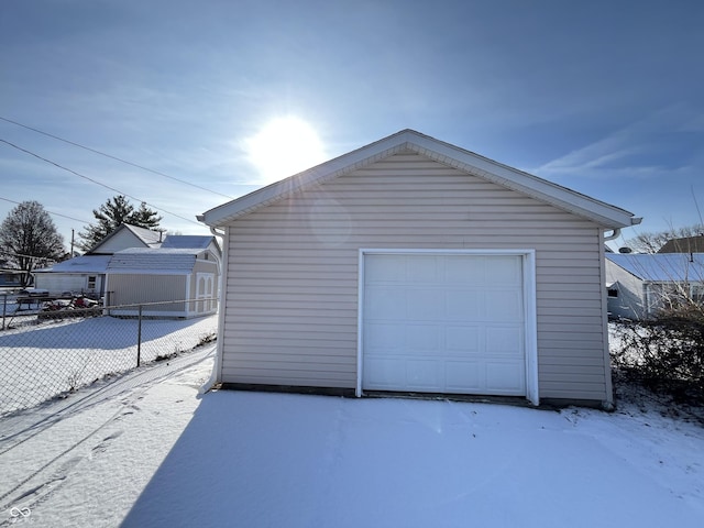 view of snow covered garage