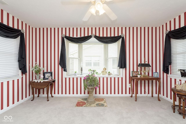 interior space featuring ceiling fan