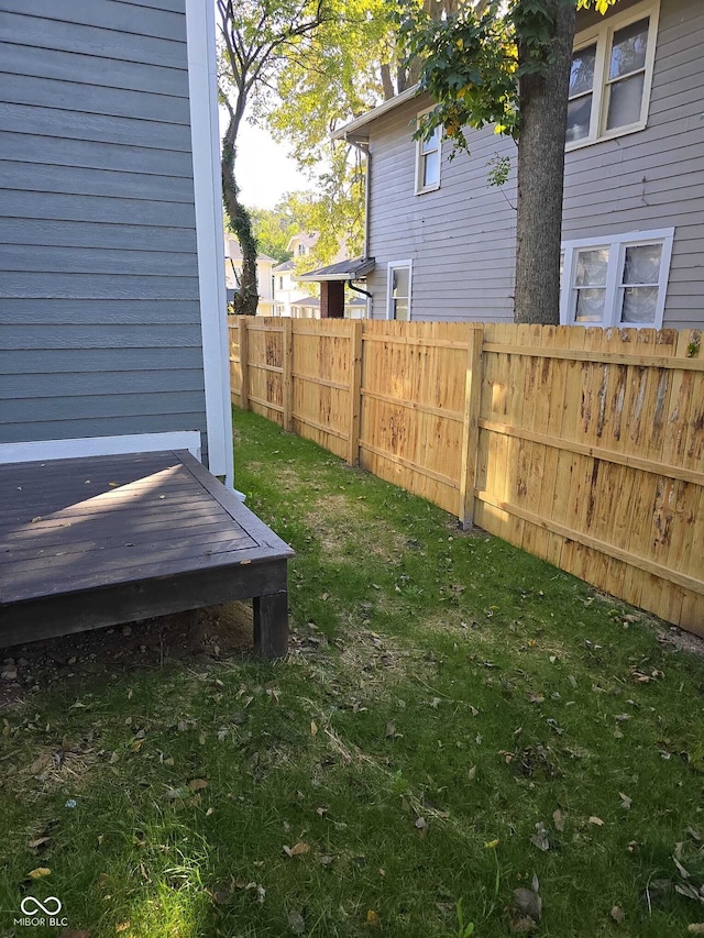 view of yard with a wooden deck