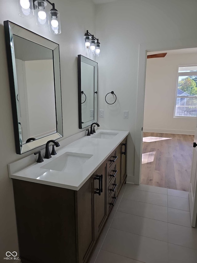 bathroom with hardwood / wood-style floors and vanity