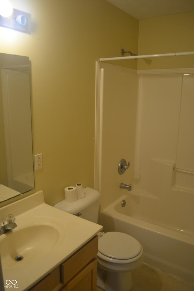 full bathroom featuring tile patterned flooring, vanity, toilet, and shower / tub combination